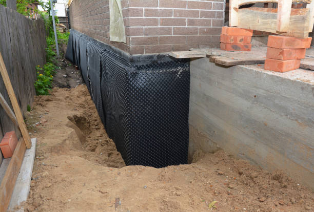 SJ Waterproofing Pros technician performing targeted Waterproofing assessment in Lakewood, NY